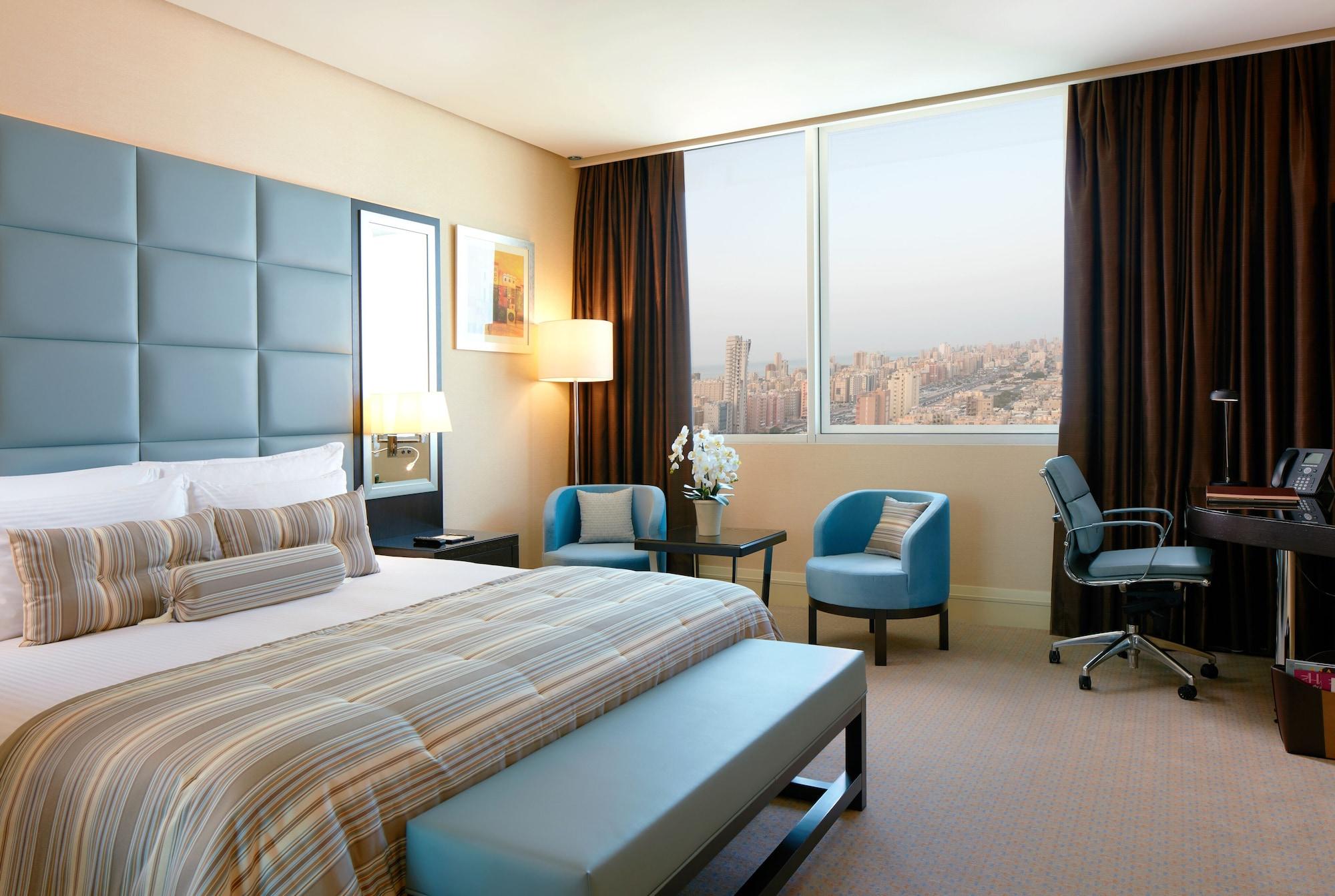 Millennium Hotel & Convention Centre Kuwait Кувейт Экстерьер фото A room at the hotel