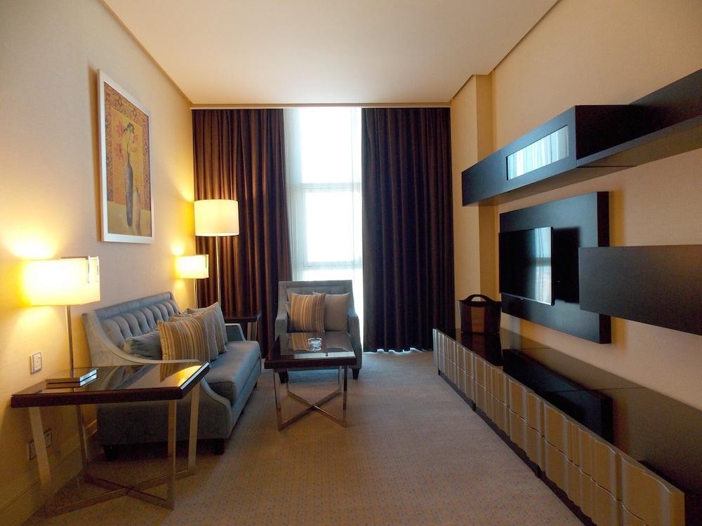 Millennium Hotel & Convention Centre Kuwait Кувейт Экстерьер фото A living room in a suite at the Ritz-Carlton, Dubai