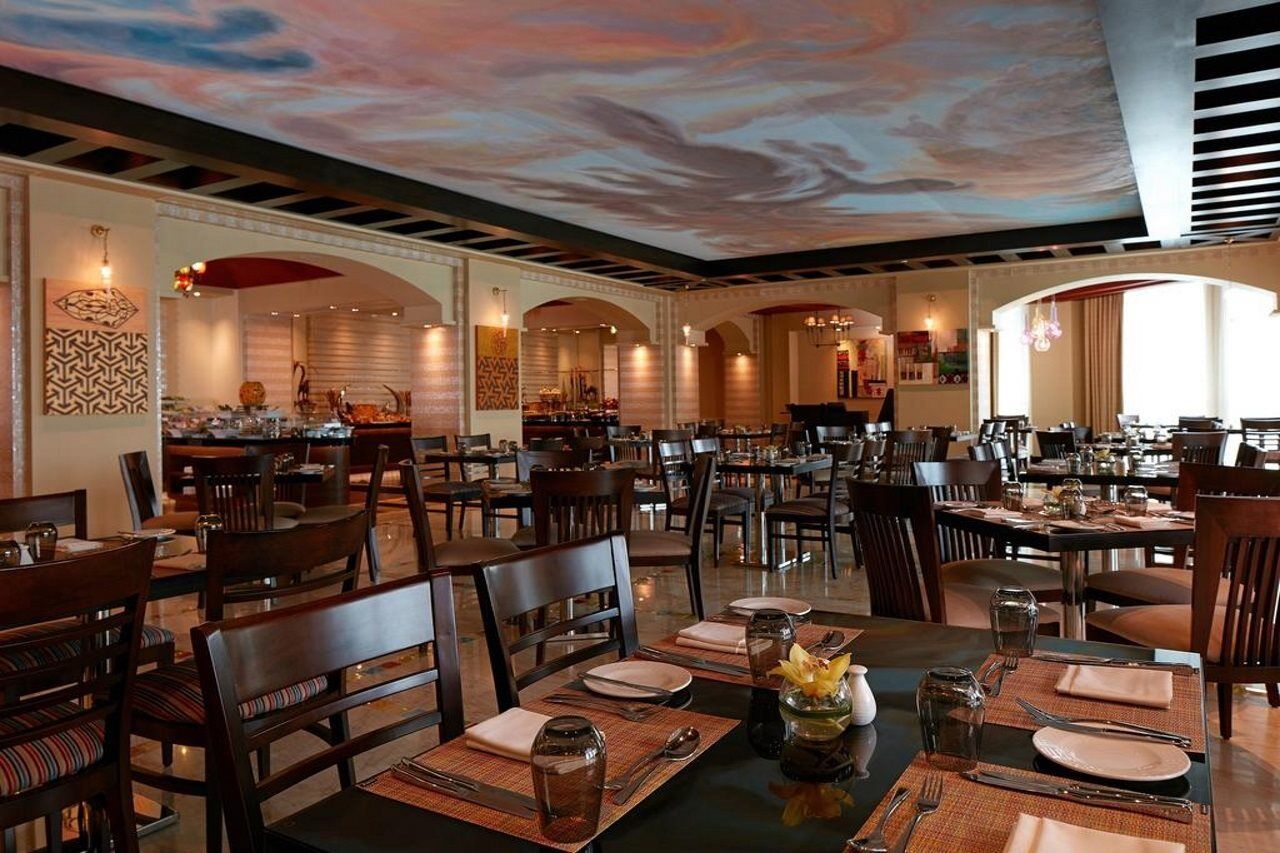 Millennium Hotel & Convention Centre Kuwait Кувейт Экстерьер фото The interior of a typical Olive Garden restaurant
